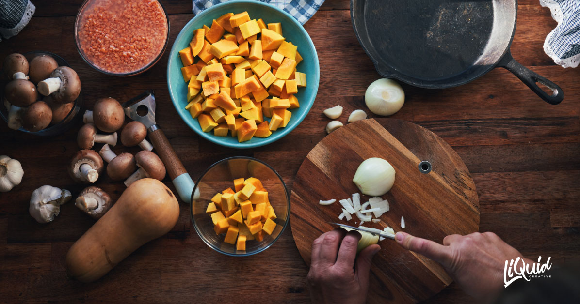 person chopping up food
